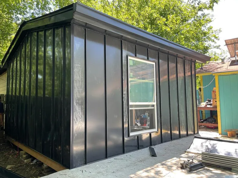 Black standing seam metal wall panels for Metal Roof Installation in Hughson